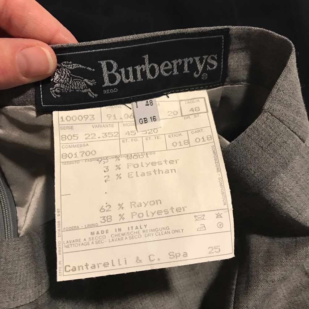 Burberrys size 48 (12) grey wool skirt. Like new.slit in back